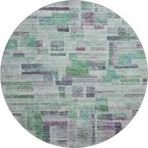 Photo of 8' Artichoke Green Purple And Teal Striped Washable Round Rug With UV Protection