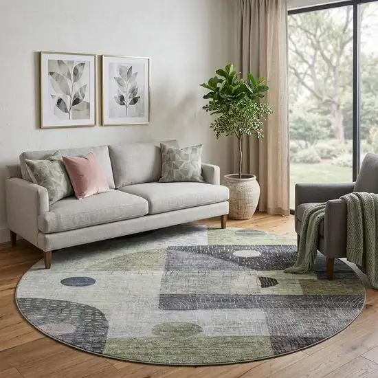 8' Artichoke Green Silver And Gray Geometric Washable Round Rug With UV Protection Photo 1