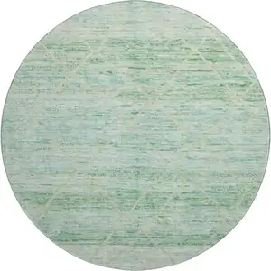Photo of 8' Artichoke Green Teal And Ivory Abstract Geometric Washable Round Rug With UV Protection