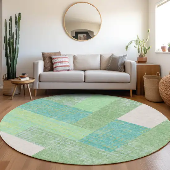 8' Artichoke Green Teal And Ivory Geometric Washable Round Rug With UV Protection Photo 4