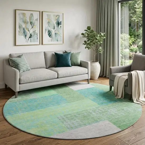 8' Artichoke Green Teal And Ivory Geometric Washable Round Rug With UV Protection Photo 1
