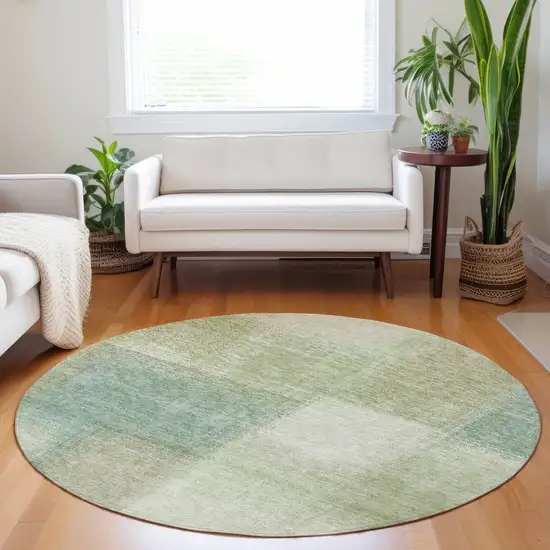 8' Artichoke Green Teal Blue And Beige Abstract Washable Round Rug With UV Protection Photo 4