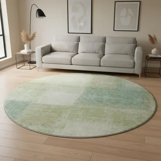8' Artichoke Green Teal Blue And Beige Abstract Washable Round Rug With UV Protection Photo 2