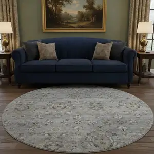 Photo of 8' Ash Gray Brown And Ivory Floral Medallion Washable Round Rug With UV Protection