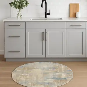 Photo of 4' Beige Abstract Power Loom Round Rug