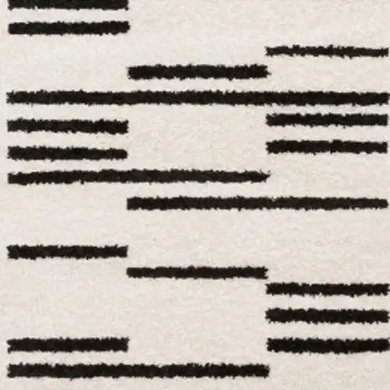 7' Beige And Black Abstract Runner Rug Photo 4