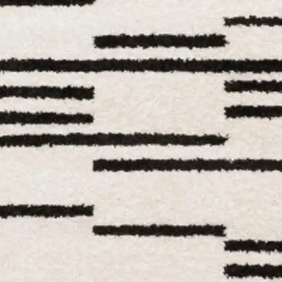 7' Beige And Black Abstract Runner Rug Photo 3