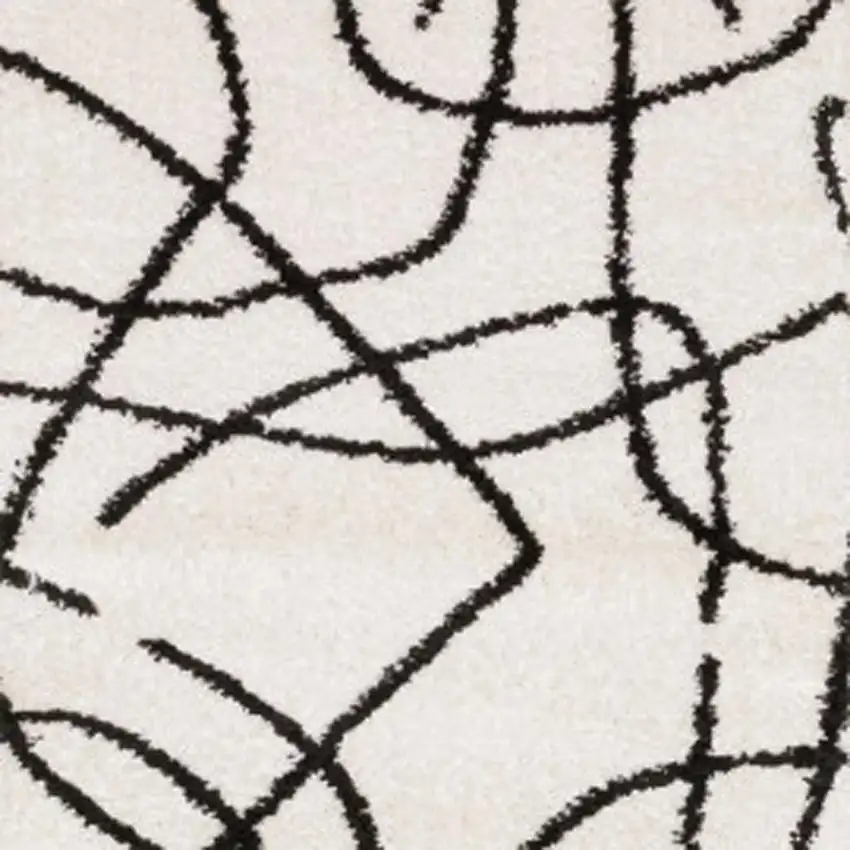 7' Beige And Black Abstract Runner Rug Photo 4