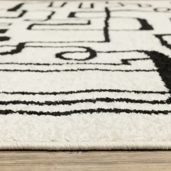 7' Beige And Black Geometric Runner Rug Photo 7