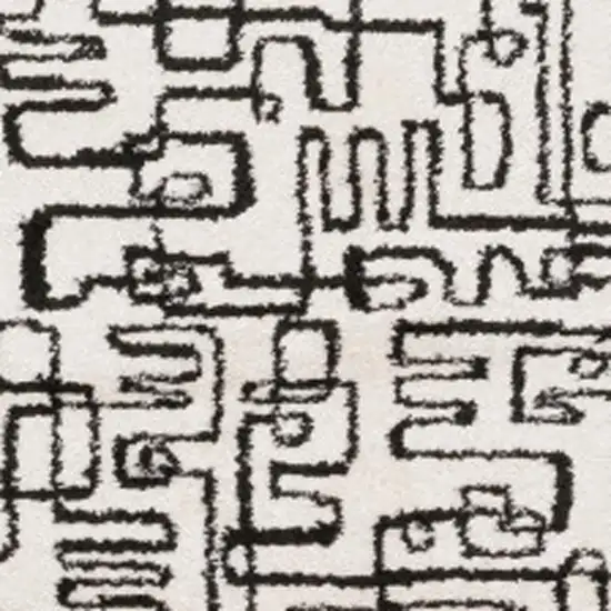 7' Beige And Black Geometric Runner Rug Photo 4