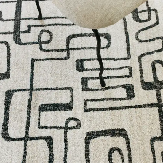 7' Beige And Black Geometric Runner Rug Photo 8