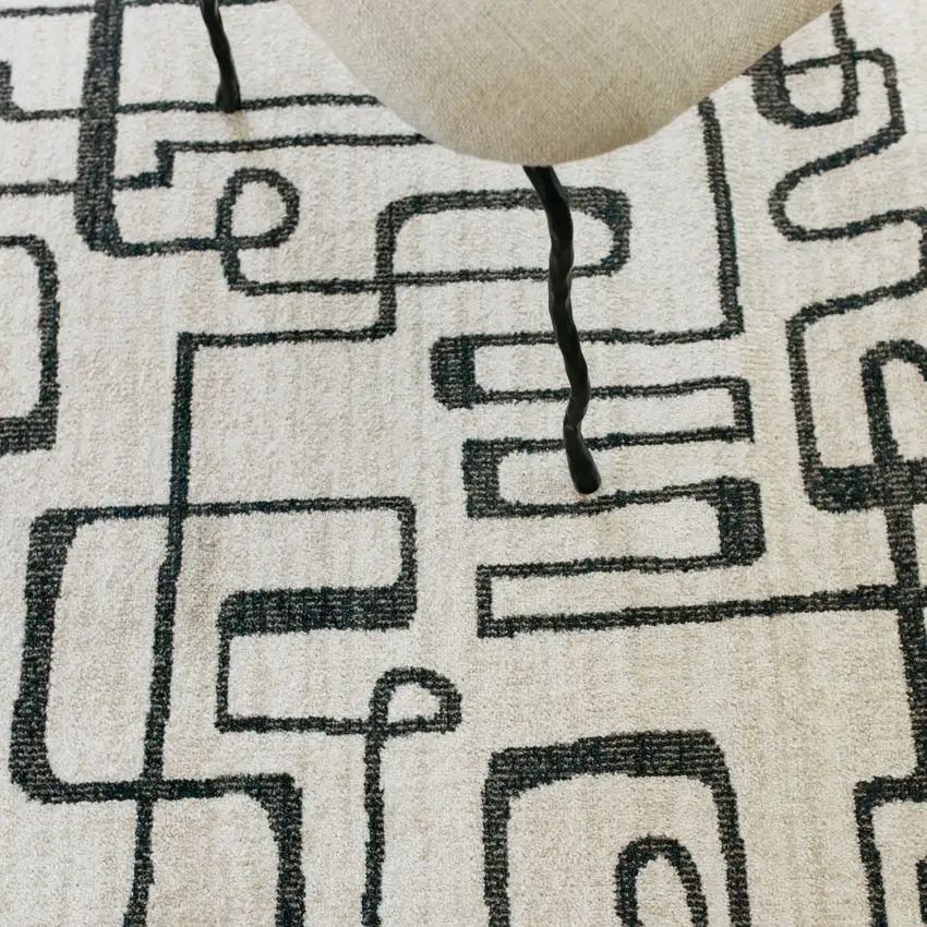 7' Beige And Black Geometric Runner Rug Photo 8