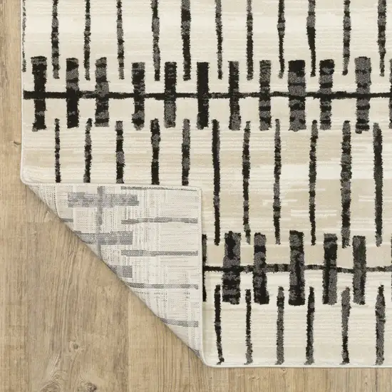 8' Beige And Black Geometric Runner Rug Photo 9