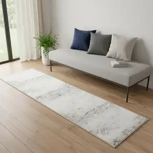 Photo of 7' Beige And Blue Abstract Distressed Runner Rug