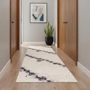 Photo of 14' Beige And Blue Abstract Runner Rug