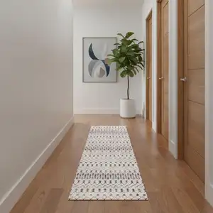 Photo of 11' Beige And Blue Abstract Runner Rug