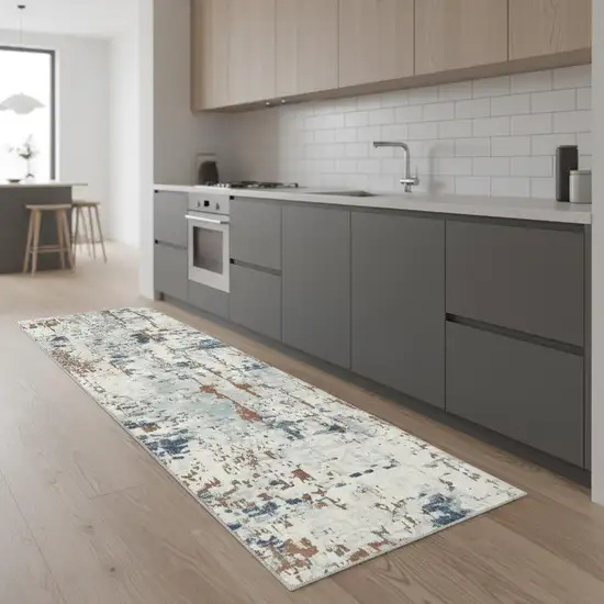 8' Beige And Blue Abstract Runner Rug Photo 1