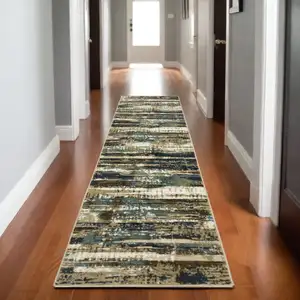 Photo of 8' Beige And Blue Abstract Runner Rug