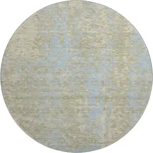 Photo of 8' Beige And Blue Abstract Washable Round Rug With UV Protection
