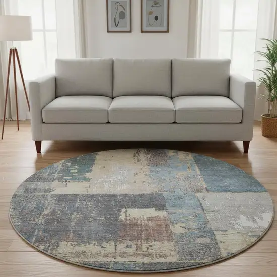 8' Beige And Blue Abstract Washable Round Rug With UV Protection Photo 2