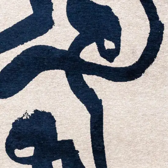 5' Beige And Blue Abstract Washable Round Rug With UV Protection Photo 3