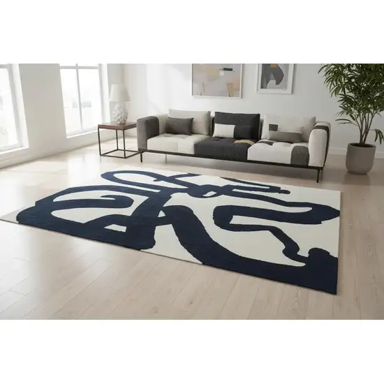 8' Beige And Blue Abstract Washable Round Rug With UV Protection Photo 1