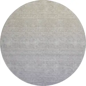 Photo of 8' Beige And Blue Ombre Washable Round Rug With UV Protection