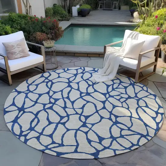 8' Beige And Blue Round Geometric Washable Indoor Outdoor Area Rug Photo 6