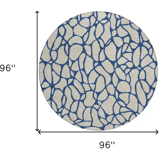 8' Beige And Blue Round Geometric Washable Indoor Outdoor Area Rug Photo 3