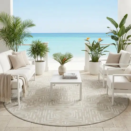 8' Beige And Blue Round Geometric Washable Indoor Outdoor Area Rug Photo 1