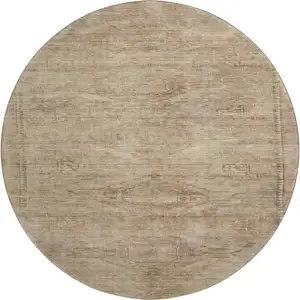 Photo of 8' Beige And Brown Abstract Geometric Washable Round Rug With UV Protection