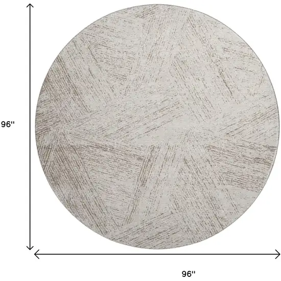 8' Beige And Brown Abstract Washable Round Rug With UV Protection Photo 8