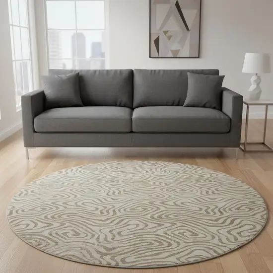 8' Beige And Brown Abstract Washable Round Rug With UV Protection Photo 2