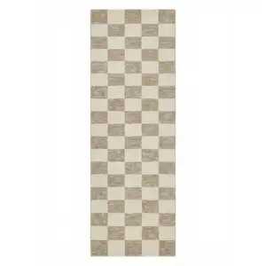 Photo of 8' Beige And Brown Checkered Area Rug