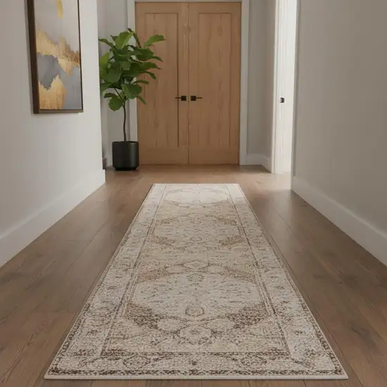 10' Beige And Brown Floral Distressed Runner Rug Photo 1