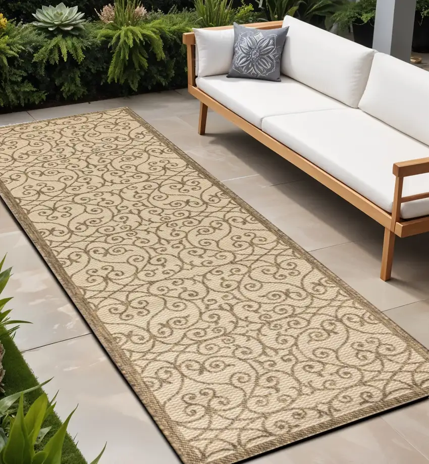 8' Beige And Brown Geometric Indoor Outdoor Runner Rug Photo 1