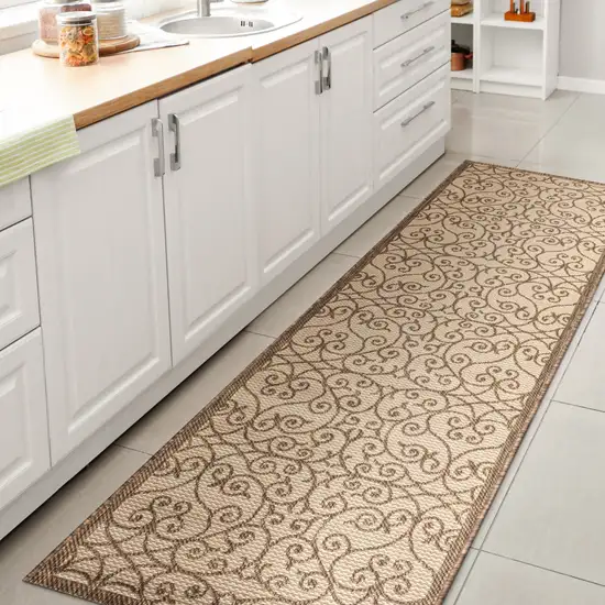 8' Beige And Brown Geometric Indoor Outdoor Runner Rug Photo 6