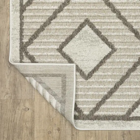 8' Beige And Brown Geometric Runner Rug Photo 9