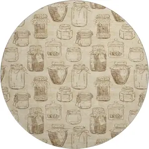Photo of 8' Beige And Brown Geometric Washable Round Rug With UV Protection