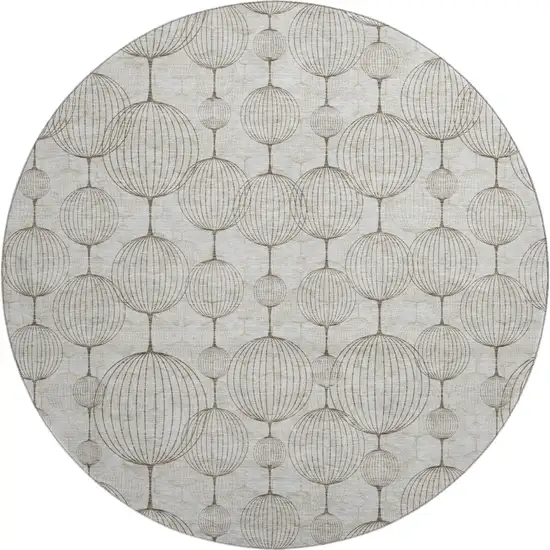 8' Beige And Brown Geometric Washable Round Rug With UV Protection Photo 1