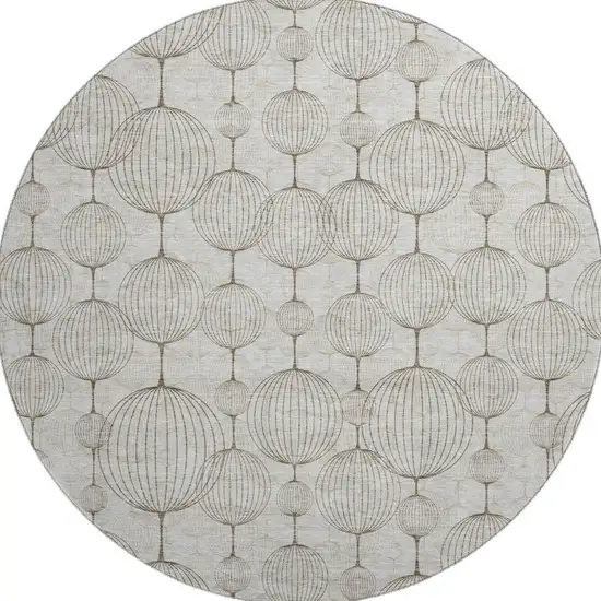 8' Beige And Brown Geometric Washable Round Rug With UV Protection Photo 4