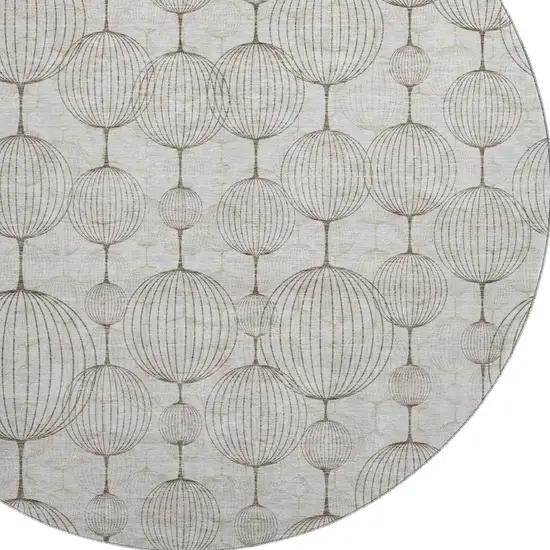 8' Beige And Brown Geometric Washable Round Rug With UV Protection Photo 3