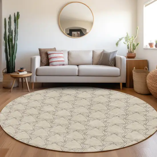 8' Beige And Brown Geometric Washable Round Rug With UV Protection Photo 4