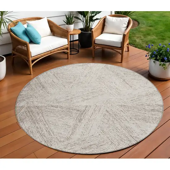 8' Beige And Brown Round Abstract Washable Indoor Outdoor Area Rug Photo 1
