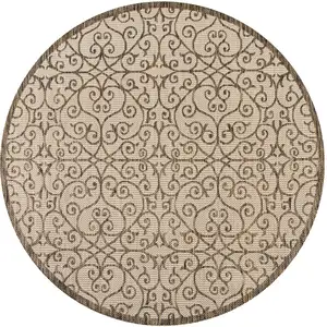 Photo of 8' Beige And Brown Round Geometric Indoor Outdoor Area Rug