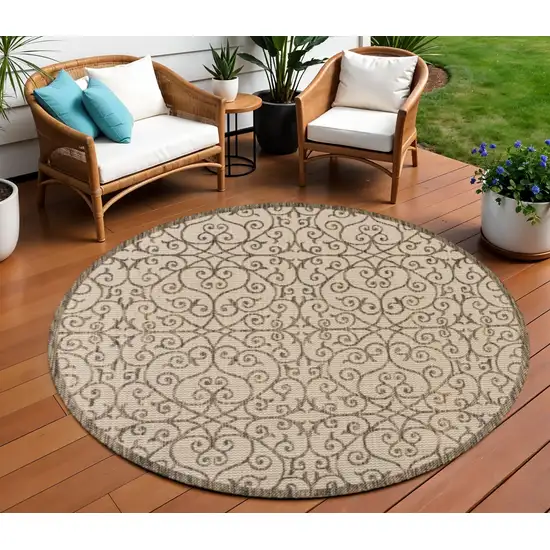 9' Beige And Brown Round Geometric Indoor Outdoor Area Rug Photo 1