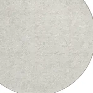 Photo of 8' Beige And Brown Round Geometric Washable Indoor Outdoor Area Rug