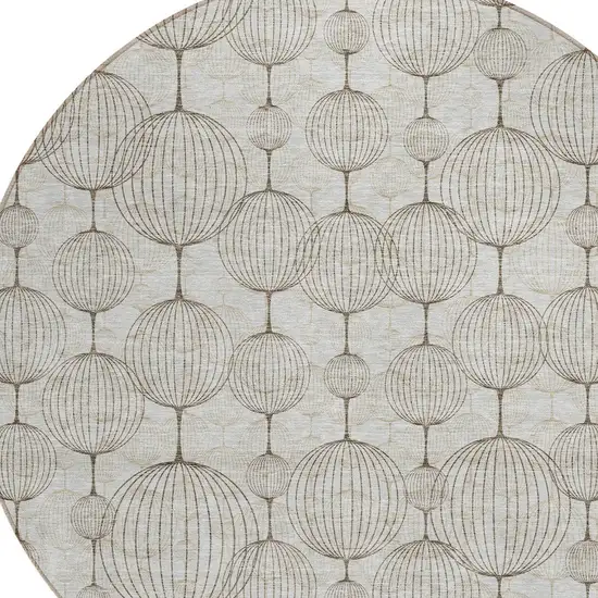 8' Beige And Brown Round Geometric Washable Indoor Outdoor Area Rug Photo 5