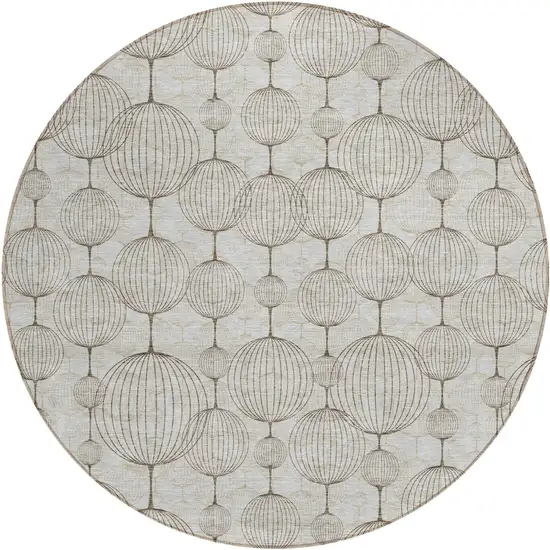8' Beige And Brown Round Geometric Washable Indoor Outdoor Area Rug Photo 1