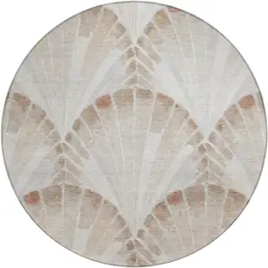 Photo of 8' Beige And Brown Round Seashell Washable Indoor Outdoor Area Rug